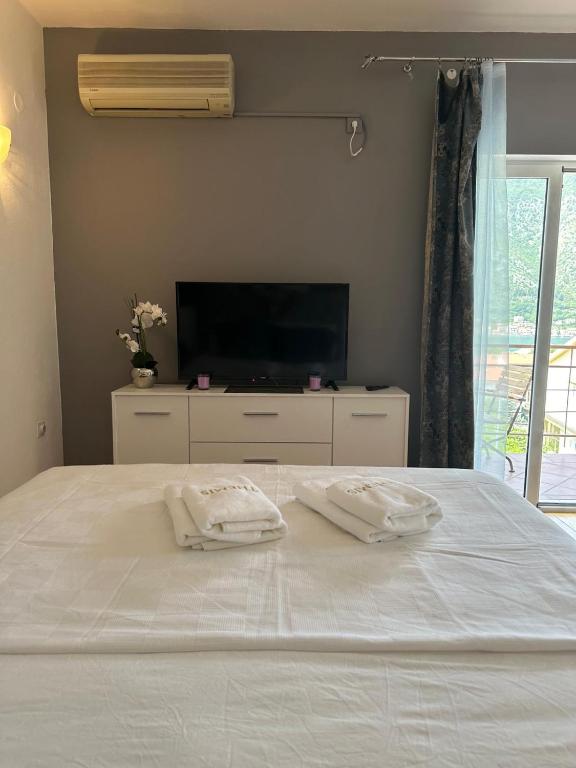 Postel nebo postele na pokoji v ubytování Themis Apart Hotel