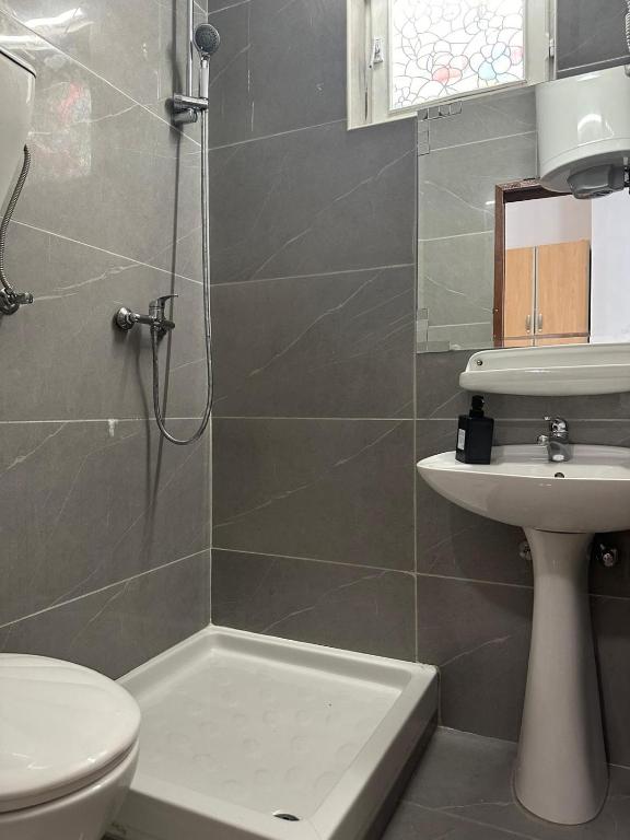 Koupelna v ubytování Themis Apart Hotel