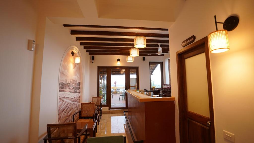 TV a/nebo společenská místnost v ubytování La Plage Seaview Suites