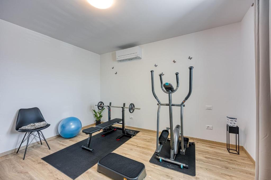 Posilňovňa alebo fitness centrum v ubytovaní Holiday House Sunset