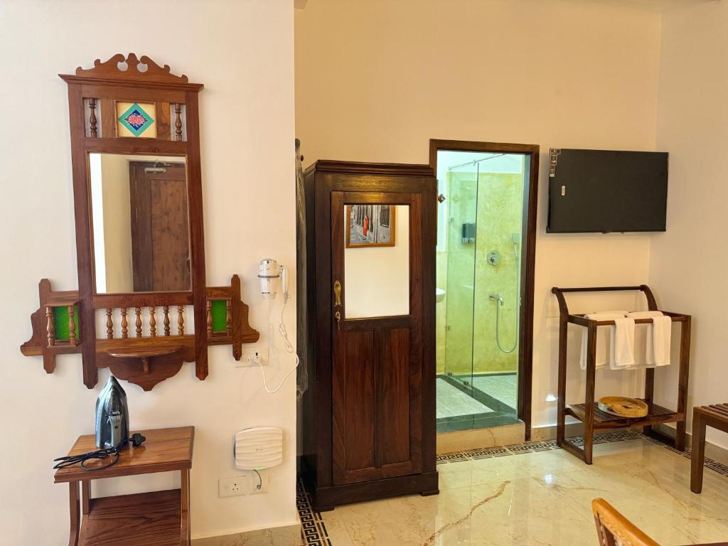 TV a/nebo společenská místnost v ubytování La Plage Seaview Suites
