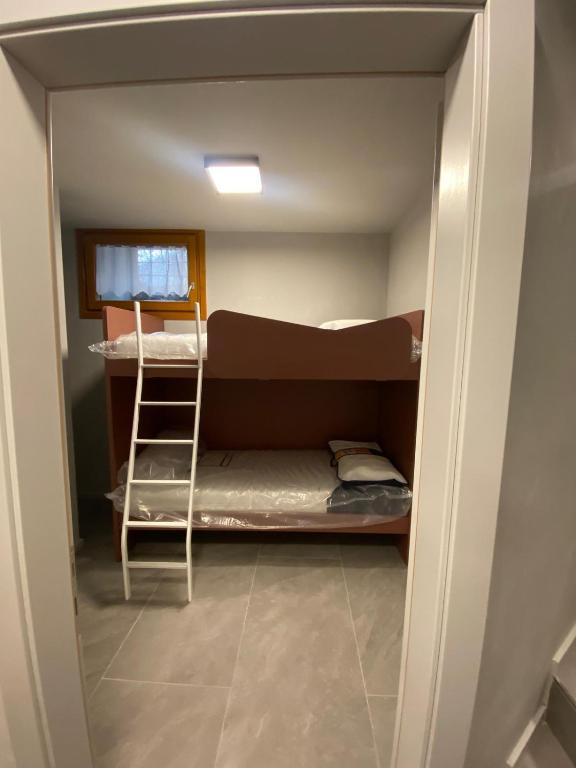 Palanda nebo palandy na pokoji v ubytování Palazzo Tof