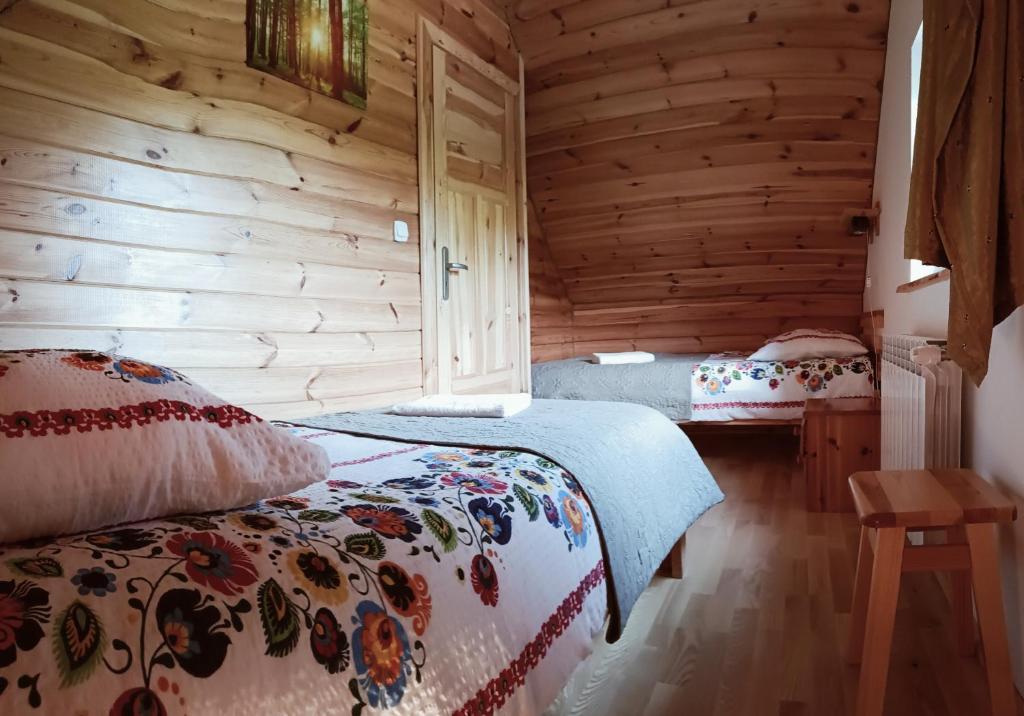 Posteľ alebo postele v izbe v ubytovaní Kyczyrka