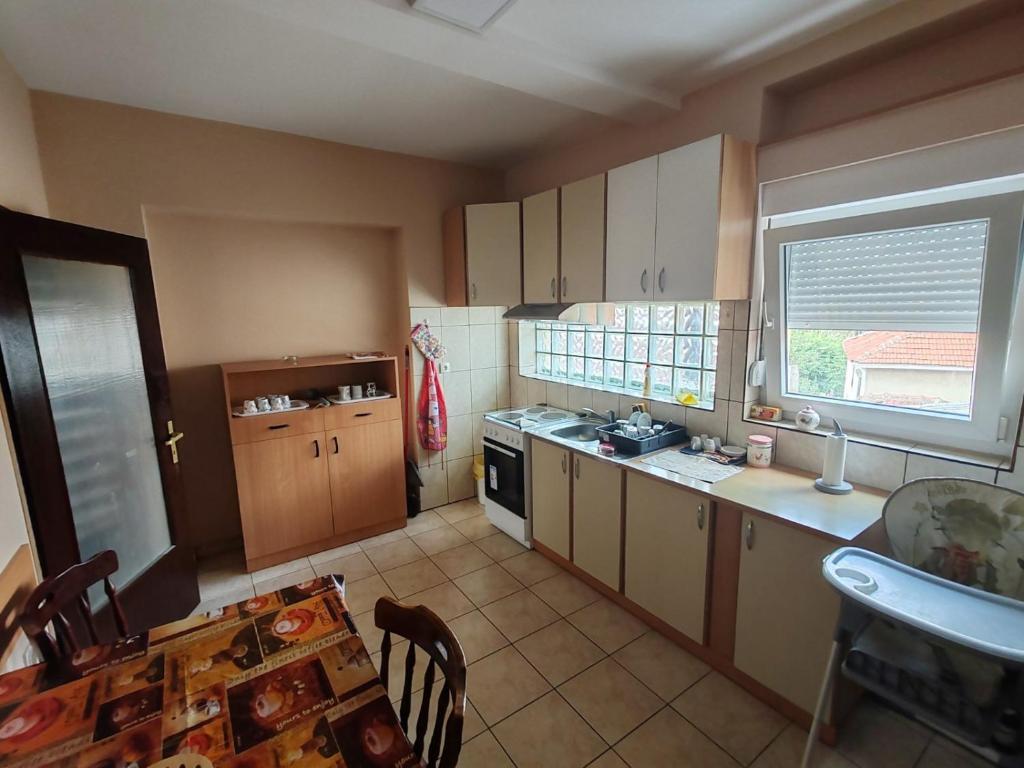 Kuchyň nebo kuchyňský kout v ubytování City Park Rooms