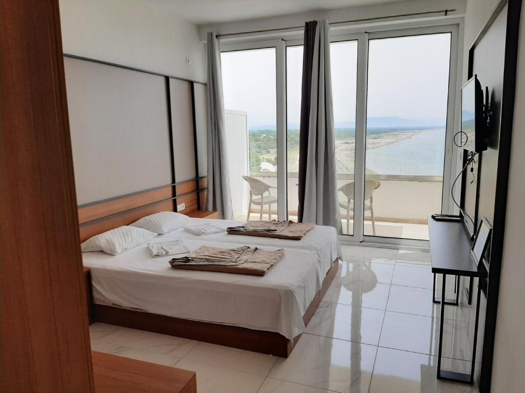 Letto o letti in una camera di Rosa Negra