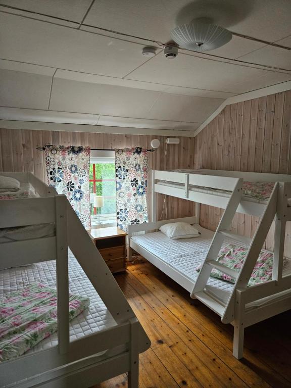 Postel nebo postele na pokoji v ubytování Idrefjällens Sport Hostel