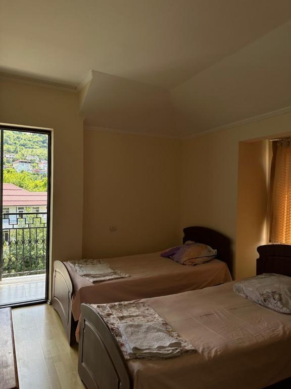Postel nebo postele na pokoji v ubytování Temo's Guesthouse