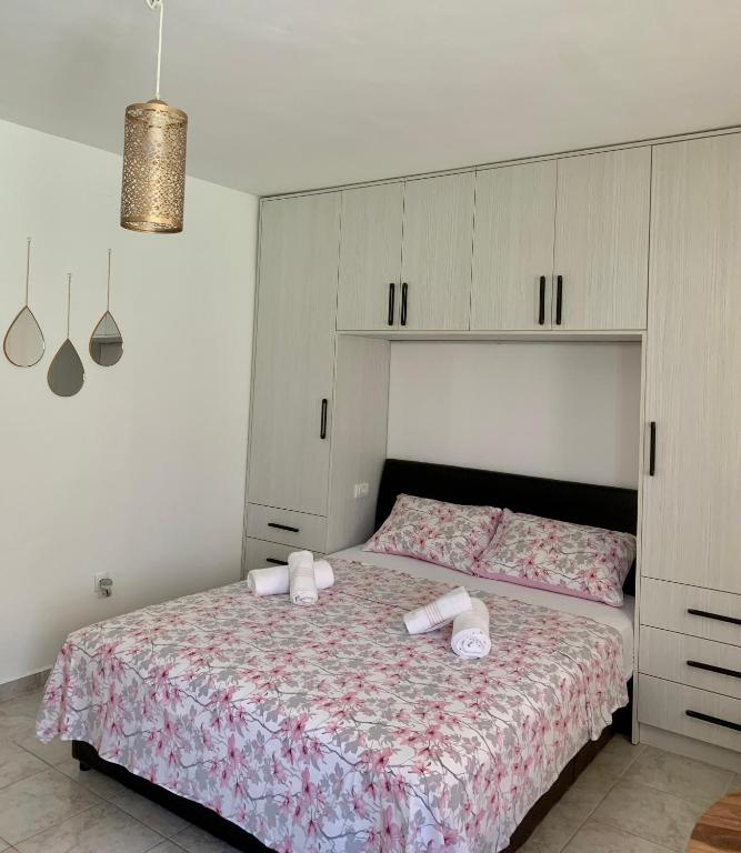 Postel nebo postele na pokoji v ubytování Apartman DMA