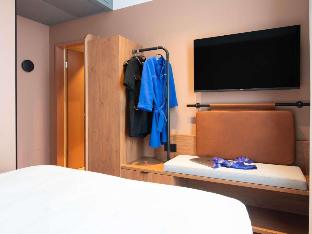 Postel nebo postele na pokoji v ubytování Aparthotel Adagio Zurich City Center