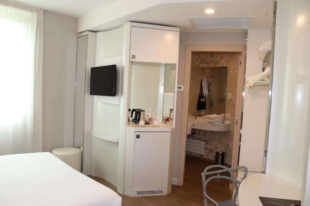 TV a/nebo společenská místnost v ubytování Ark Hotel
