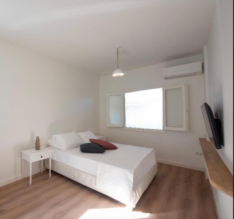 Postel nebo postele na pokoji v ubytování Holm Corfu