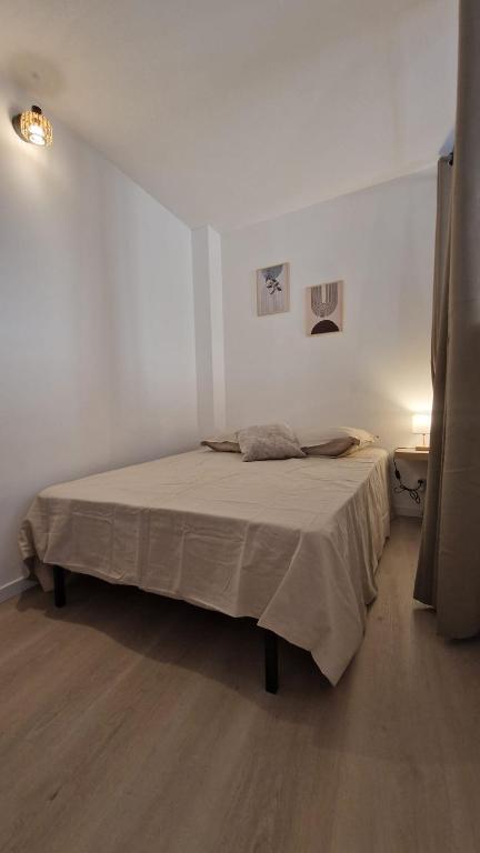 Postel nebo postele na pokoji v ubytování Le Bourg