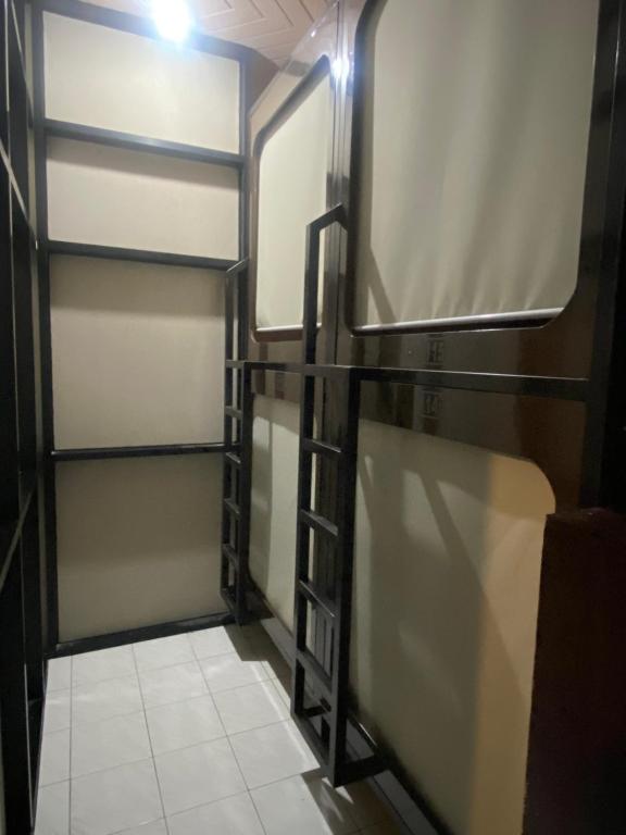 Postel nebo postele na pokoji v ubytování skyz hostel