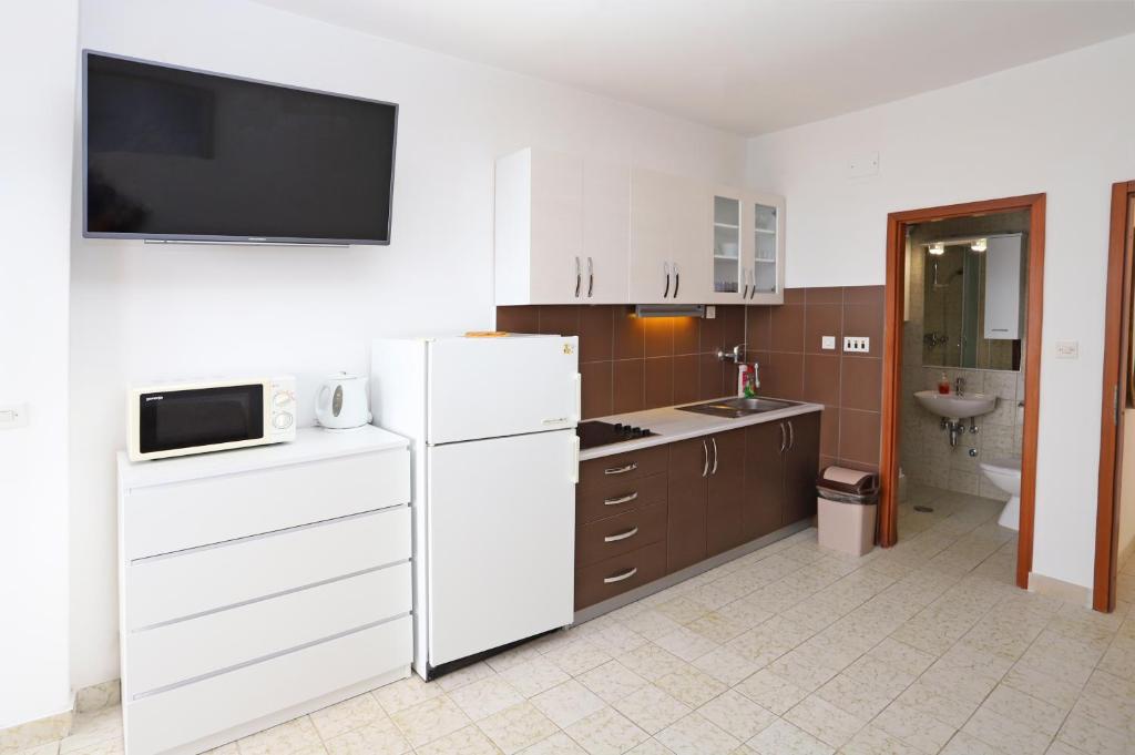 Kuchyň nebo kuchyňský kout v ubytování Apartments Edita & Robert