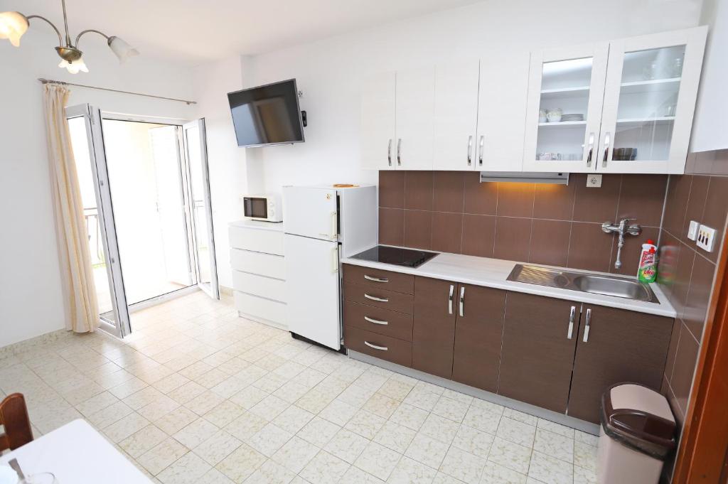 Kuchyň nebo kuchyňský kout v ubytování Apartments Edita & Robert