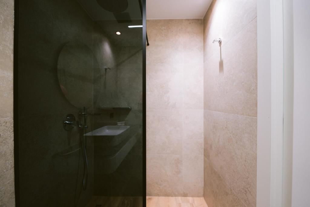 Koupelna v ubytování Noemie Hotel