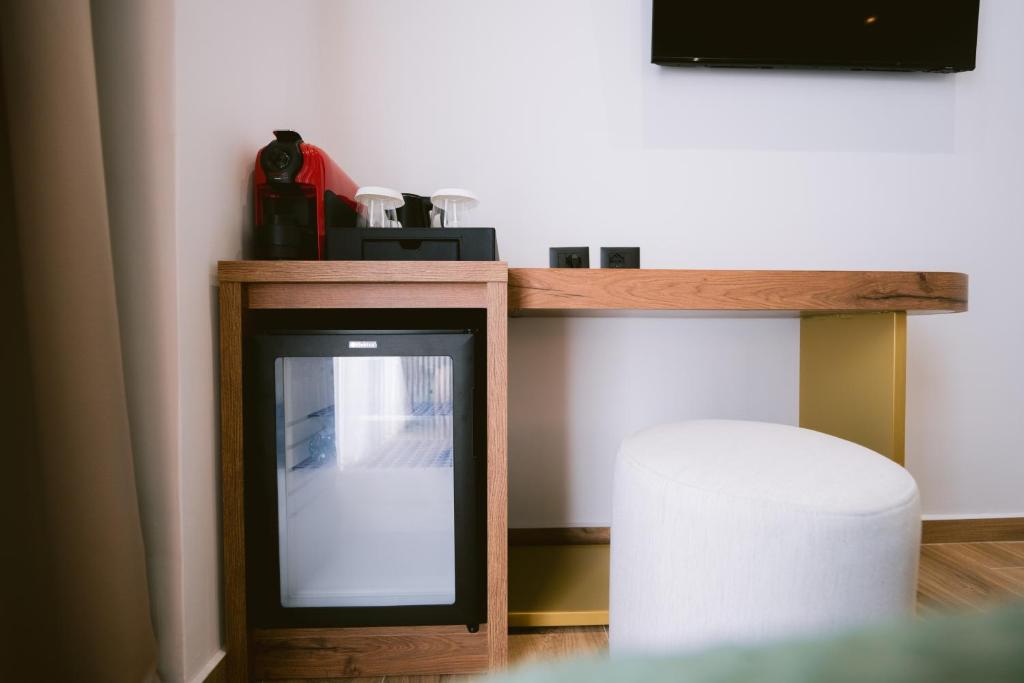 Kuchyň nebo kuchyňský kout v ubytování Noemie Hotel