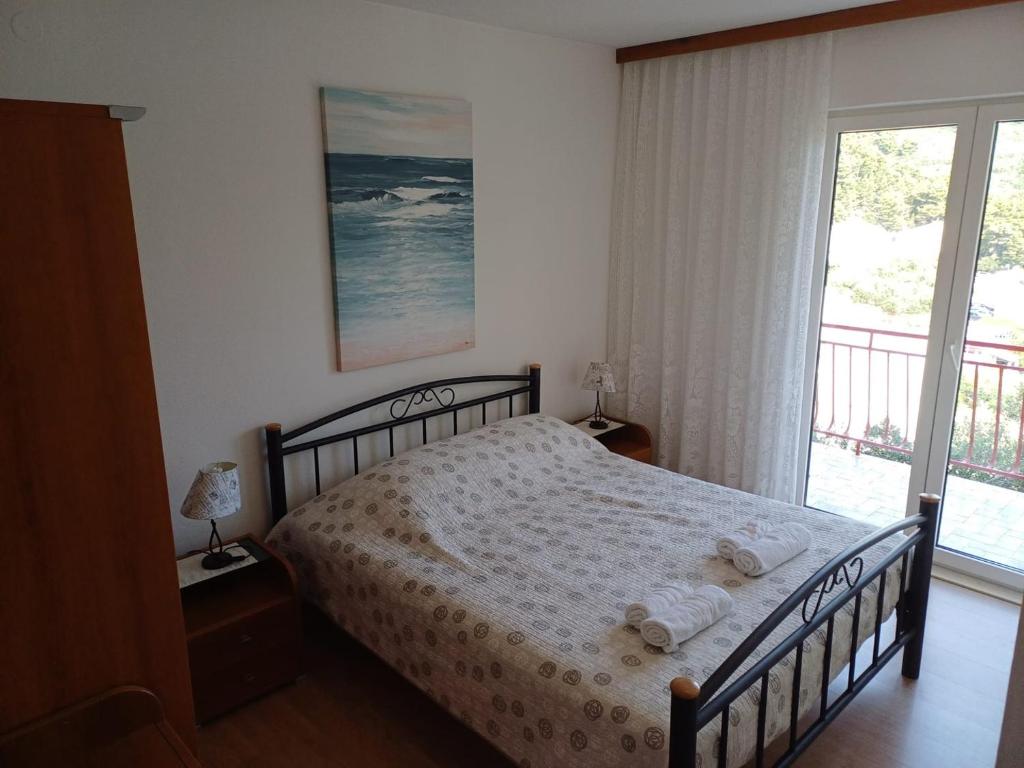 Postel nebo postele na pokoji v ubytování Villa Arija Brela