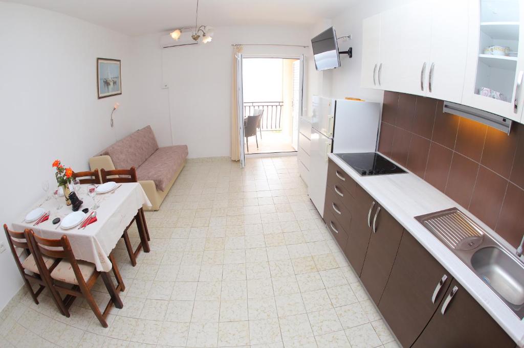 Kuchyň nebo kuchyňský kout v ubytování Apartments Edita & Robert