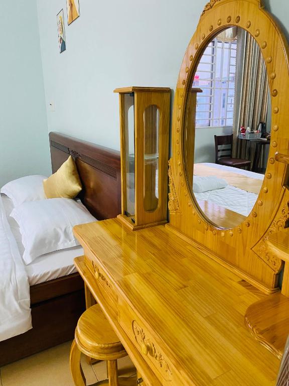 Postel nebo postele na pokoji v ubytování Phú Mỹ Port Motel
