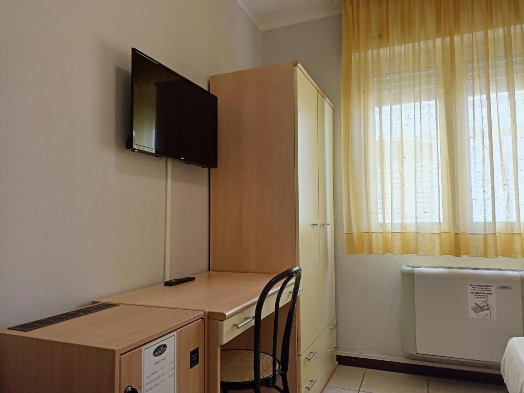 TV a/nebo společenská místnost v ubytování Hotel Ariston Imperial