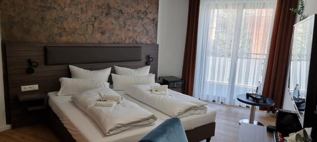 Postel nebo postele na pokoji v ubytování Central Hotel & Lounge Adult Only