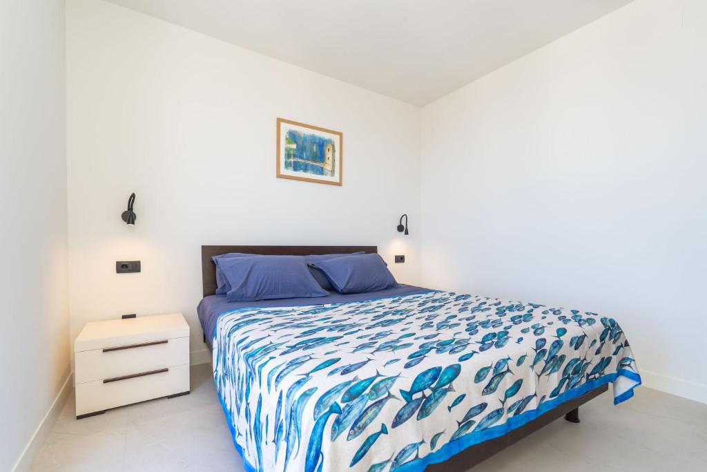 Postel nebo postele na pokoji v ubytování Apartments Ranieri Kono