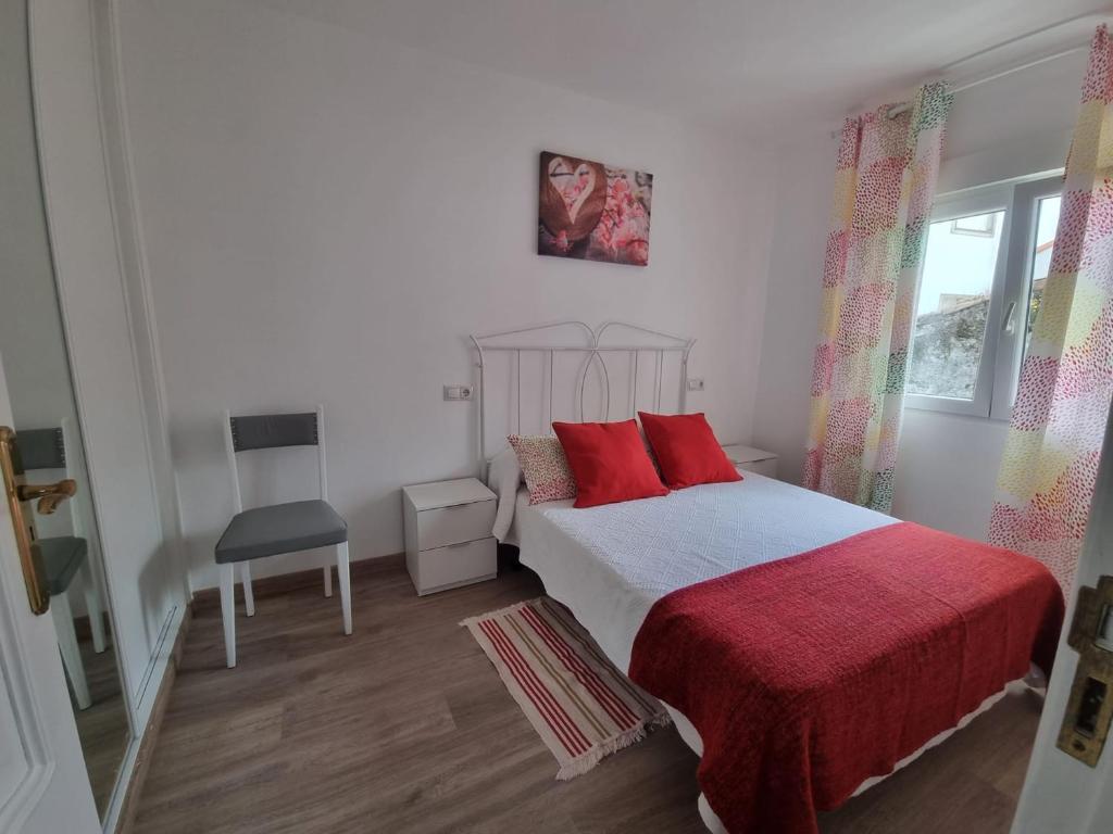 Postel nebo postele na pokoji v ubytování Casa del Carmen