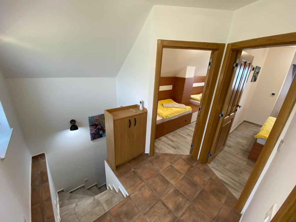 Postel nebo postele na pokoji v ubytování Vineyard Cottage Joanna