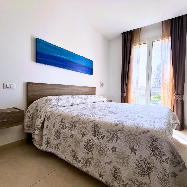 Postel nebo postele na pokoji v ubytování B&B Le Maree