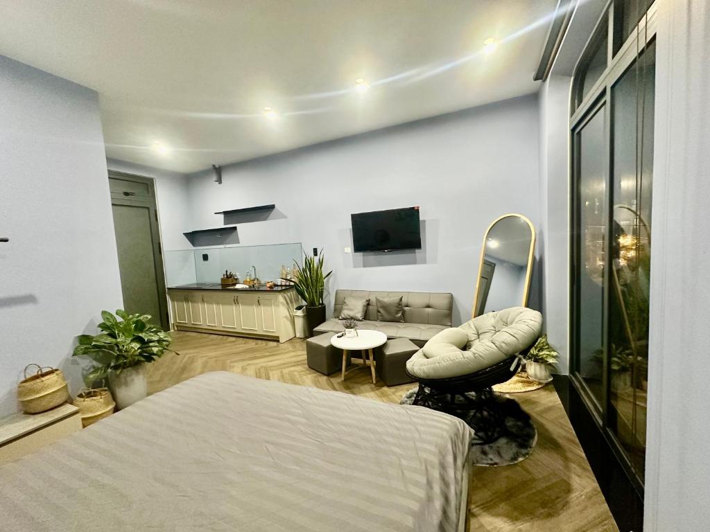 TV/trung tâm giải trí tại Green House - Căn hộ có bếp riêng