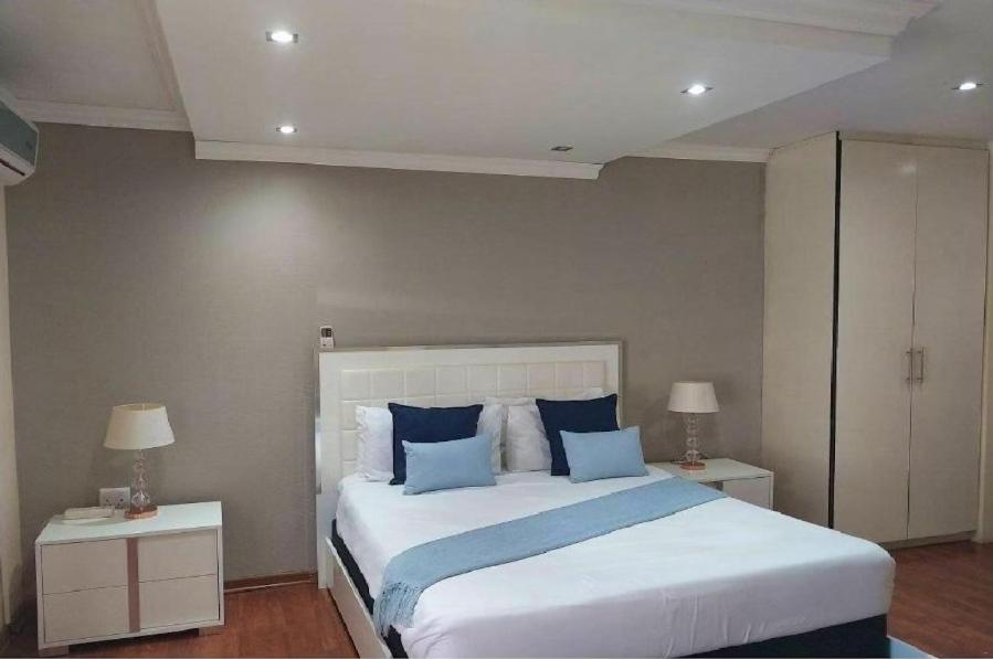 Ένα ή περισσότερα κρεβάτια σε δωμάτιο στο Ha2Cuta Boutique Hotel