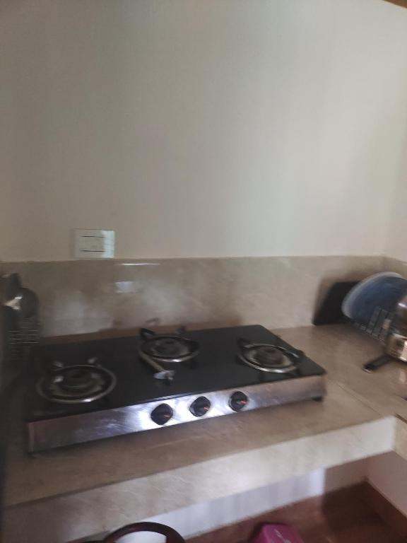 Kuchyň nebo kuchyňský kout v ubytování CELESTIAL HOMESTAY