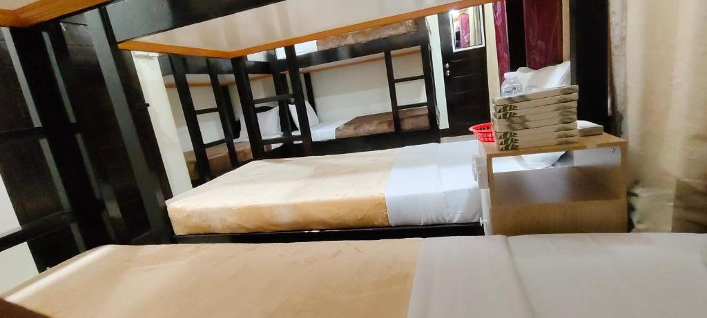 Postel nebo postele na pokoji v ubytování ISLAND VIEW SUITES