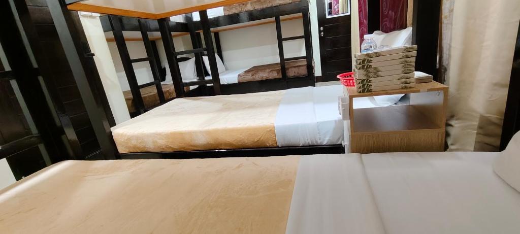 Postel nebo postele na pokoji v ubytování ISLAND VIEW SUITES