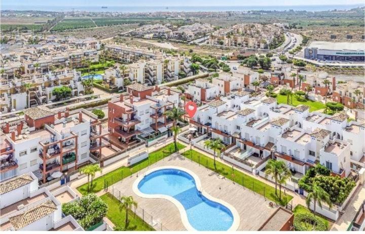 an aerial view of a city with a swimming pool at Apartamento A & M in Vera
