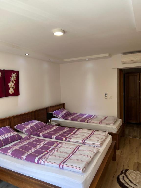 Postel nebo postele na pokoji v ubytování Motel Monte Rosa