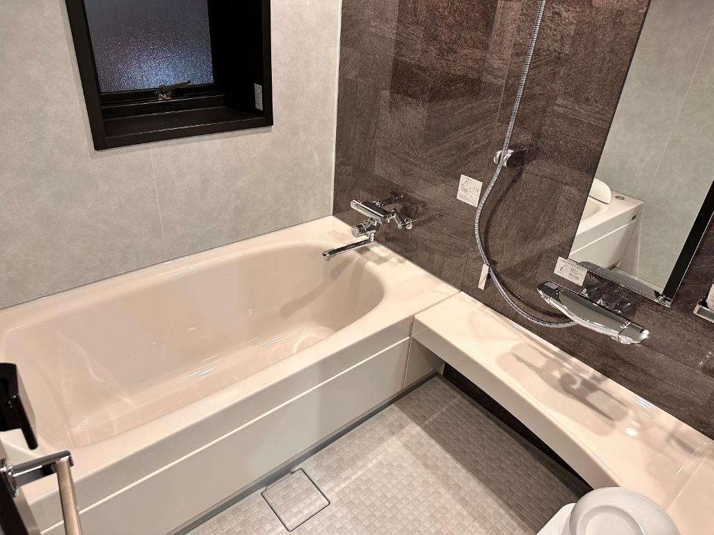 Koupelna v ubytování Reftel Osaka Itami Airport Hotel