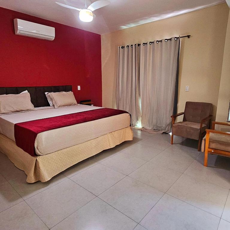 Uma cama ou camas num quarto em Hotel Pousada Bambuzal