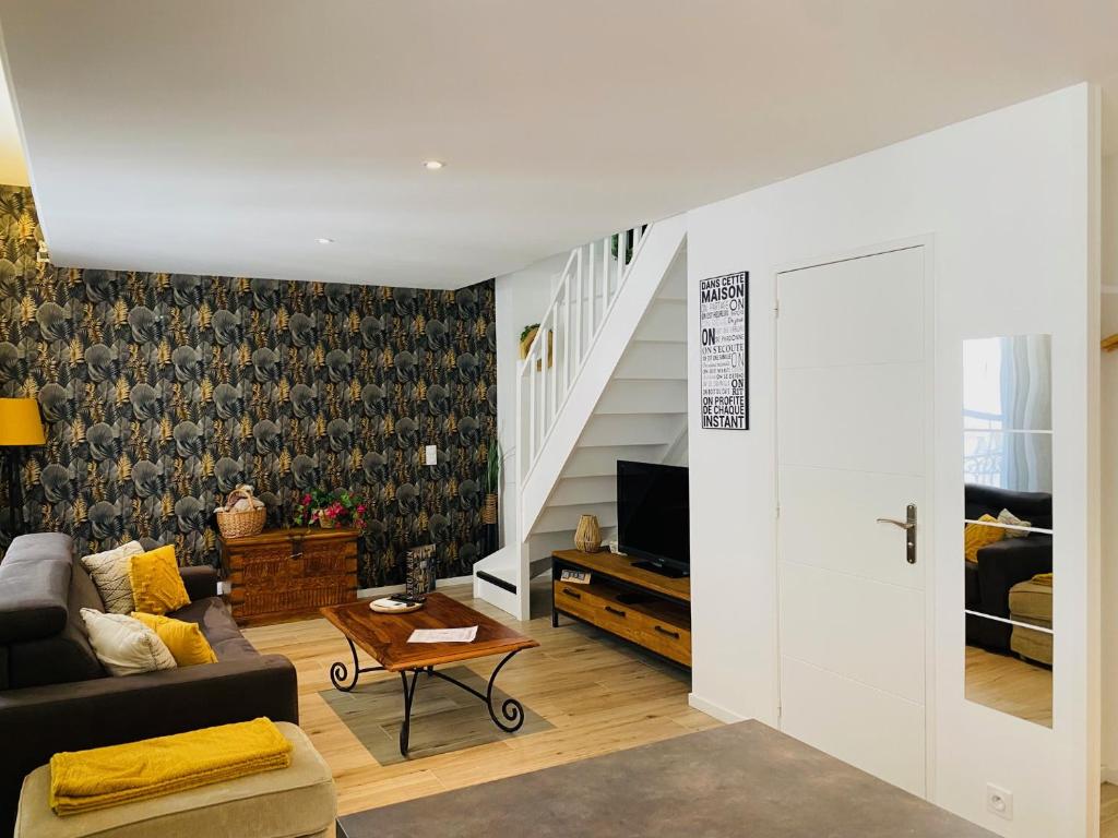 Televízia a/alebo spoločenská miestnosť v ubytovaní Douillet et coquet appartement climatisé - Parking privé gratuit - Centre Montpellier