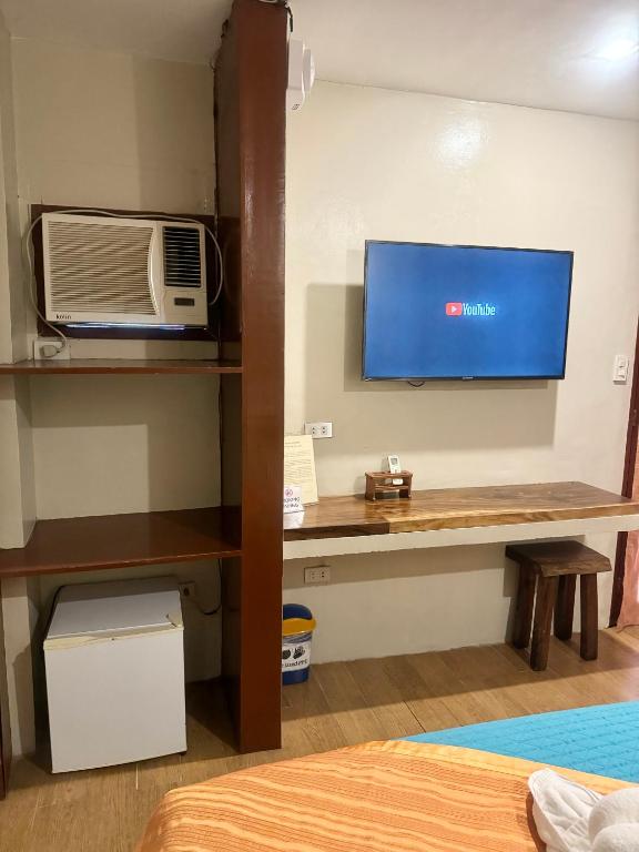 Kuchyň nebo kuchyňský kout v ubytování White Beach Suites Boracay