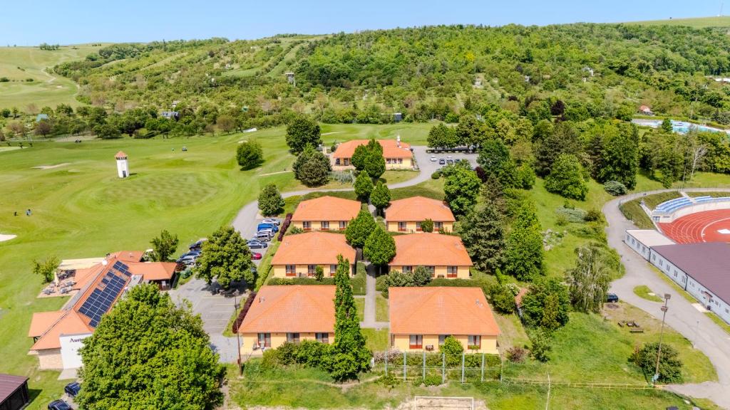 an aerial view of a resort with a golf course at Golf Hotel Austerlitz in Slavkov u Brna