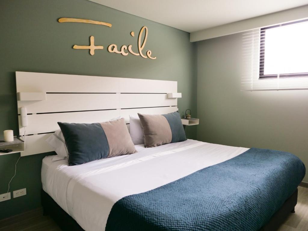 Postel nebo postele na pokoji v ubytování Facile habitaciones