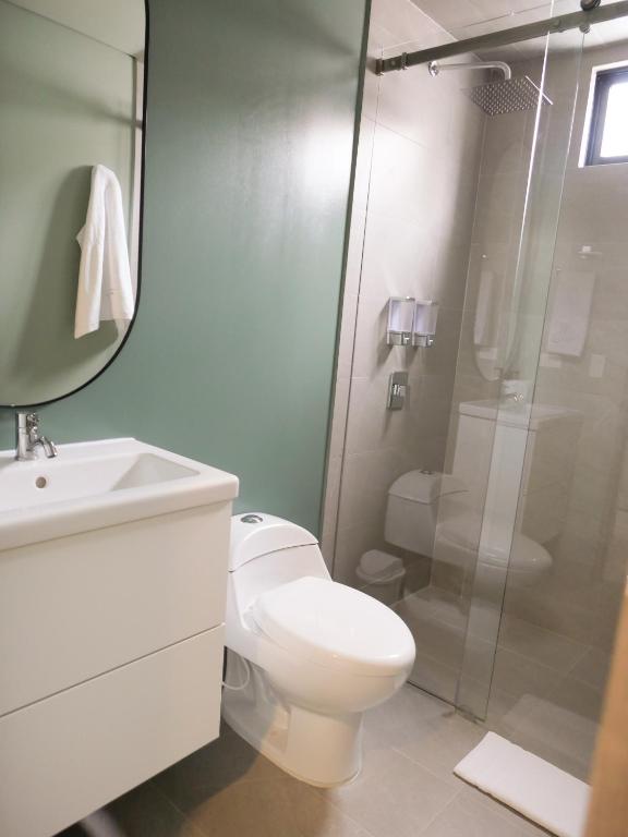 Koupelna v ubytování Facile habitaciones