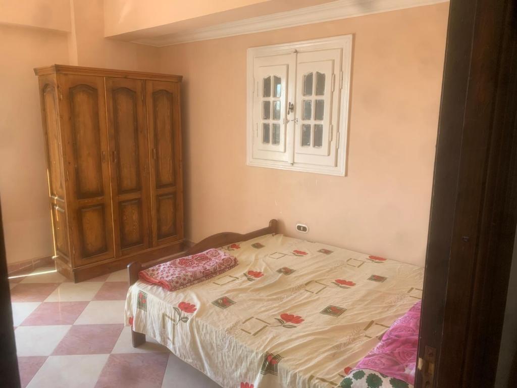Postel nebo postele na pokoji v ubytování Burj al Huda
