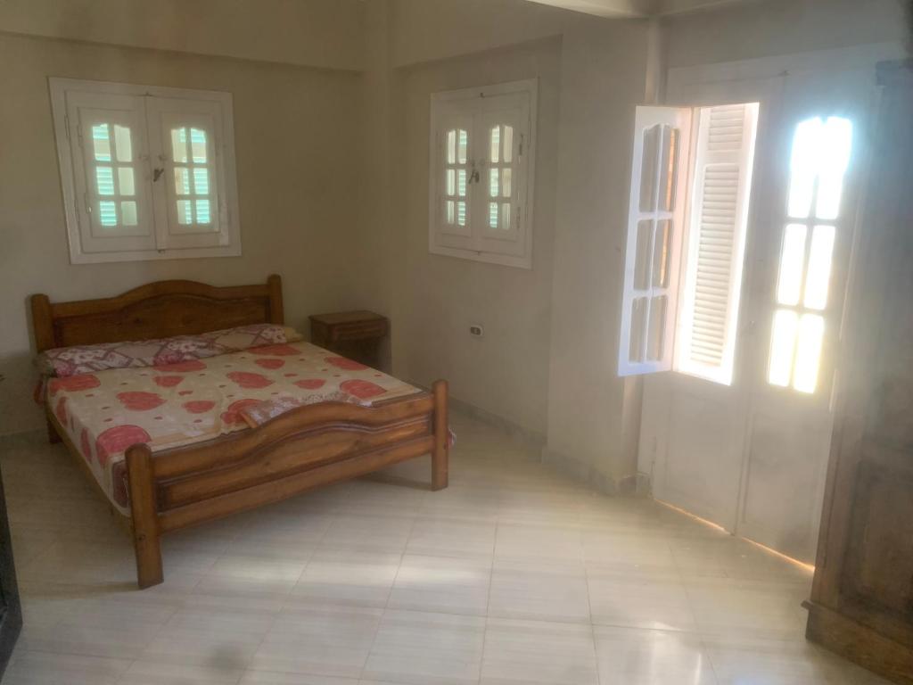 Postel nebo postele na pokoji v ubytování Burj al Huda
