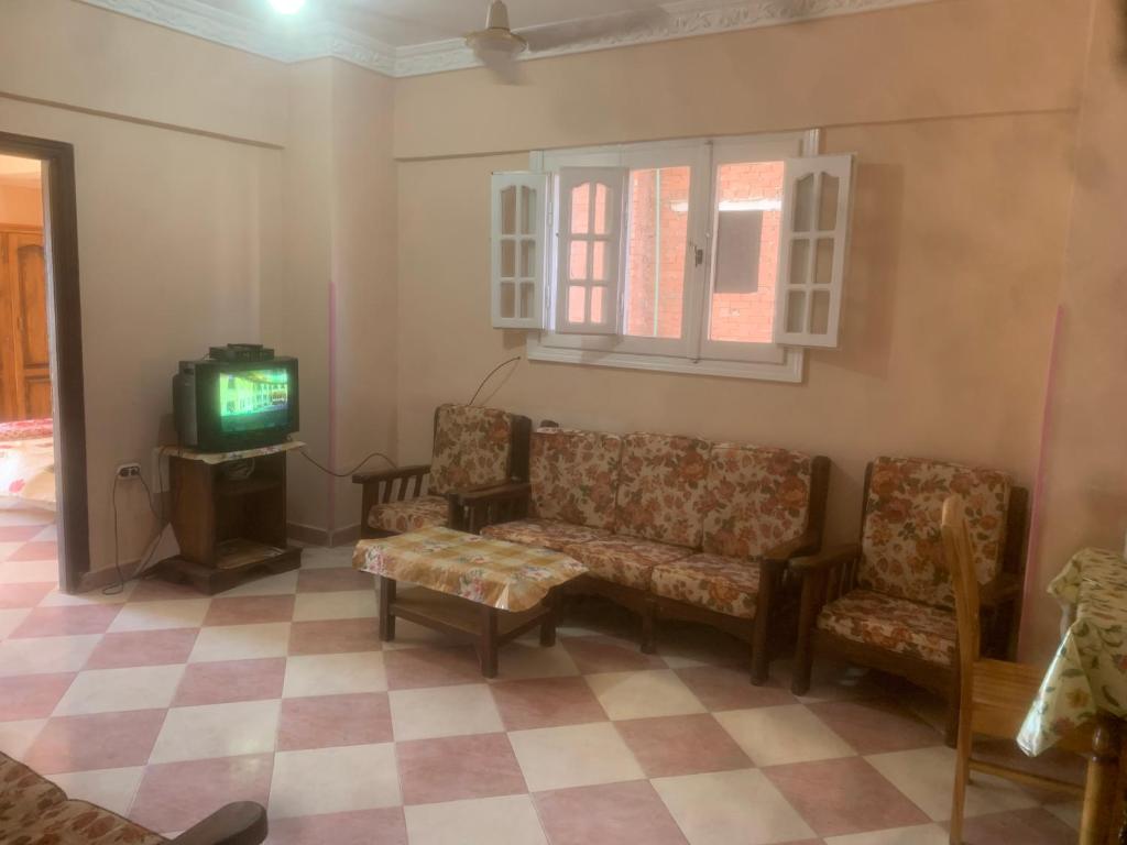 TV a/nebo společenská místnost v ubytování Burj al Huda