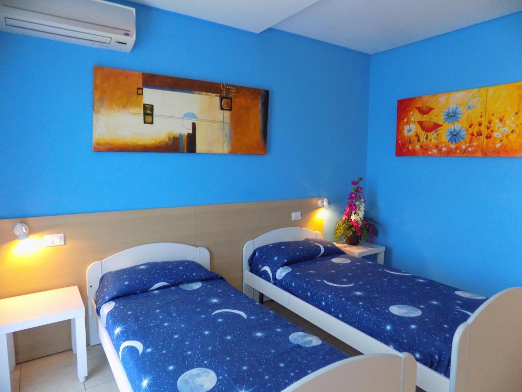 Postel nebo postele na pokoji v ubytování Hotel Residence Sole