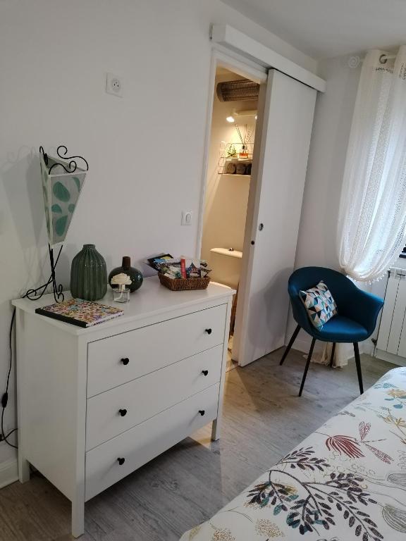 Postel nebo postele na pokoji v ubytování Chambre d'hôtes L'ECRIN DU QUERCY