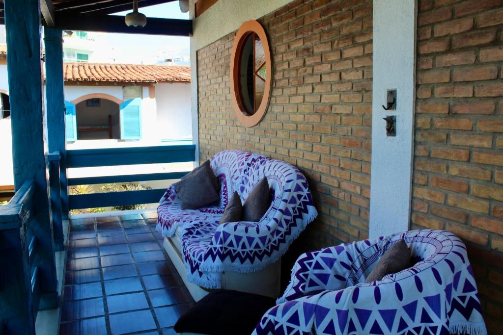 Uma área de estar em Aloha Hostel CF